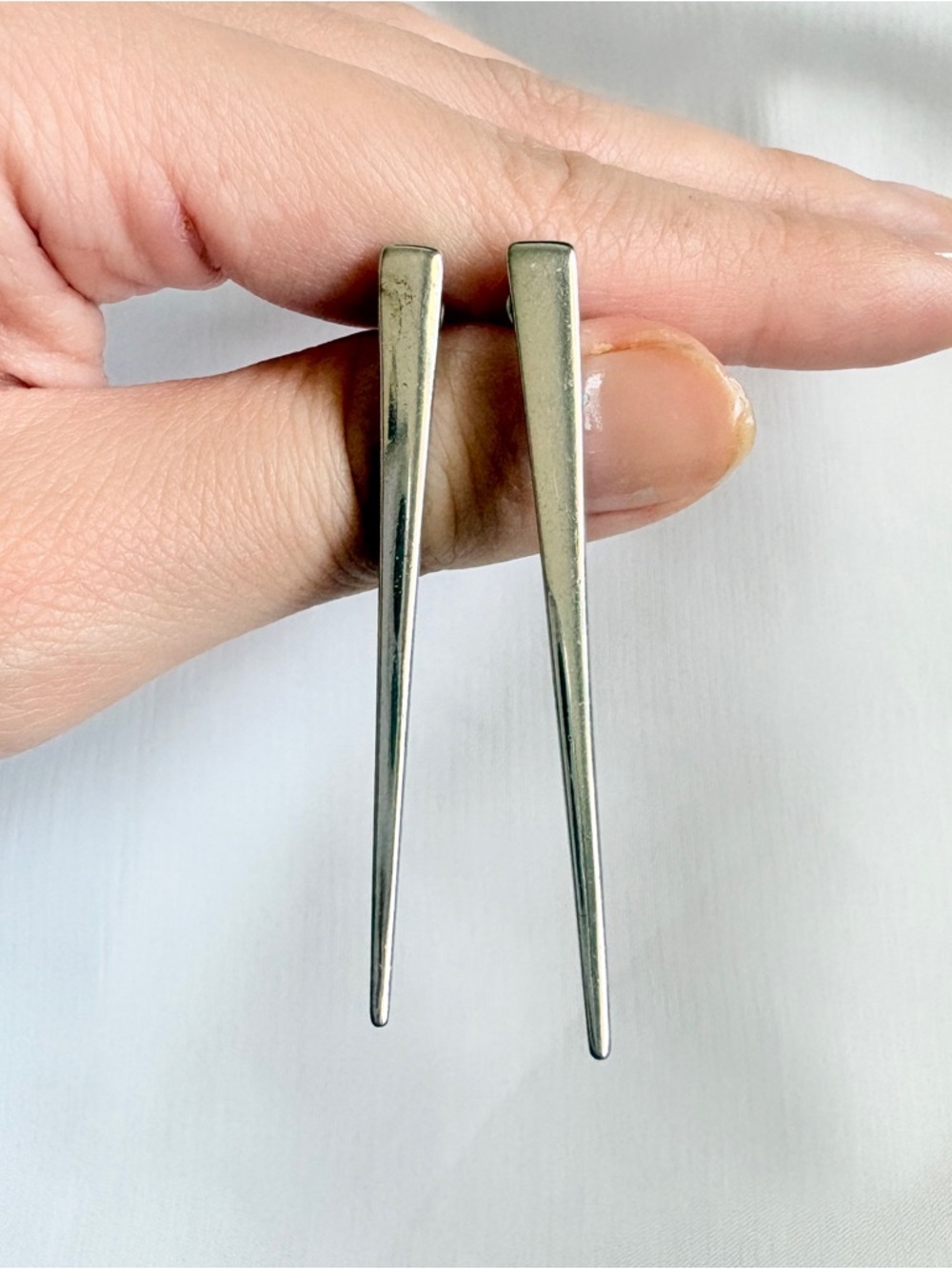 Silver toned spike stud earrings surgical steel posts